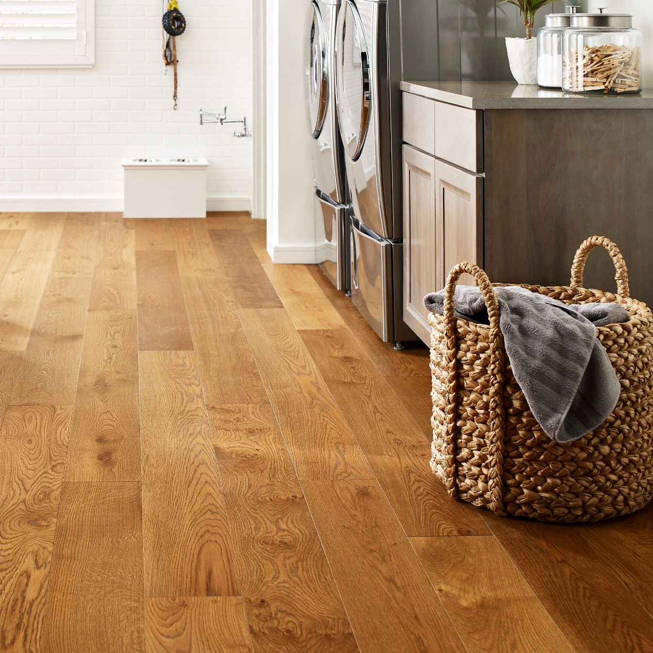 Laundry room with wood-look luxury vinyl flooring from Korfhage Floor Covering in the Louisville, KY area