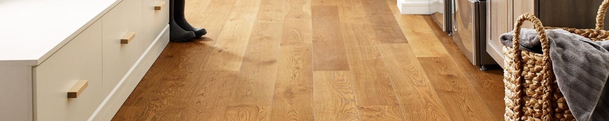 Laundry room with wood-look luxury vinyl flooring from Korfhage Floor Covering in the Louisville, KY area