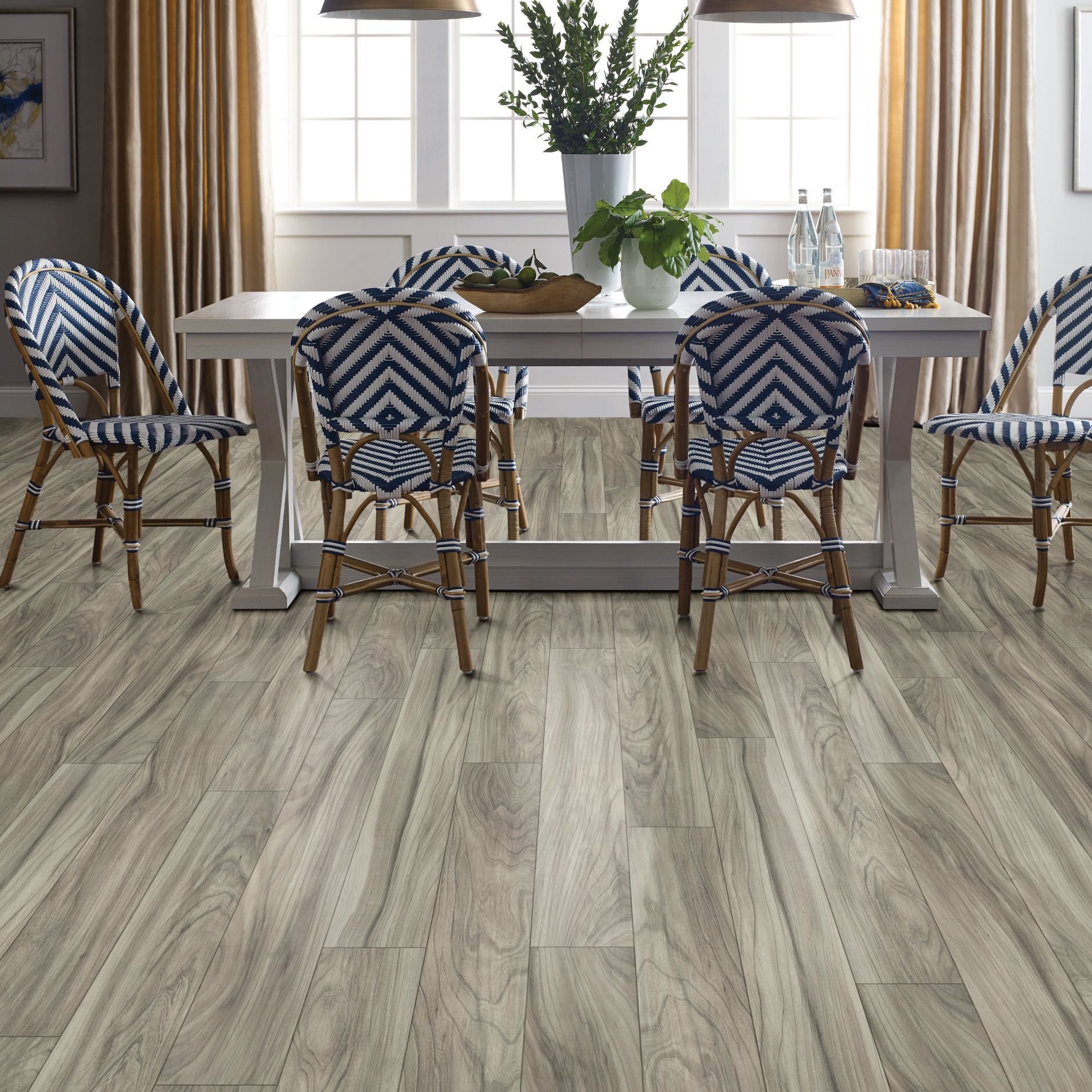 Dining room with wood-look laminate flooring from Korfhage Floor Covering in the Louisville, KY area